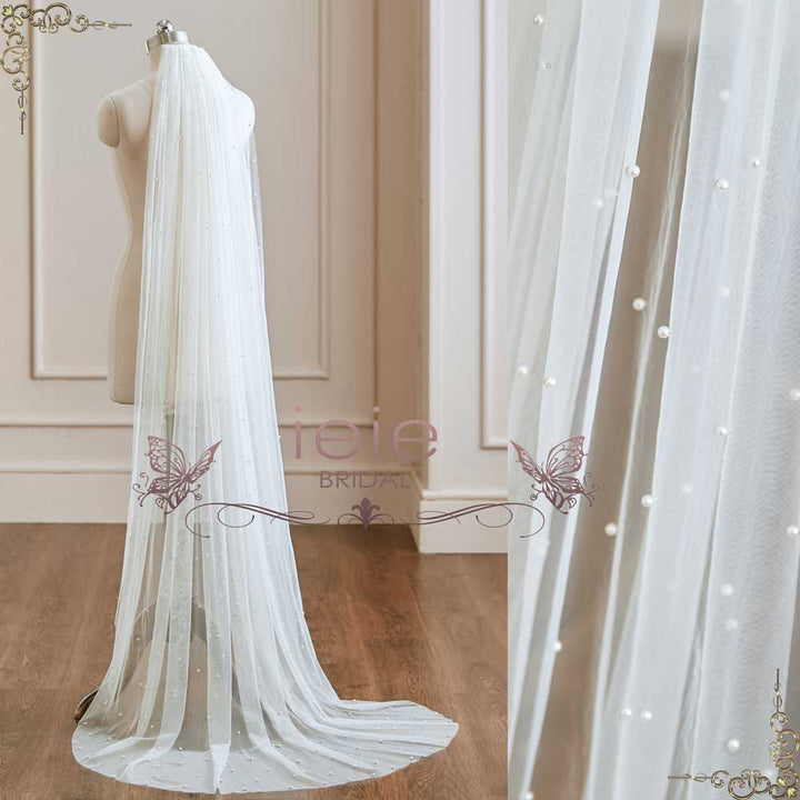 https://www.ieiebridal.com/cdn/shop/products/long-chapel-length-wedding-veil-with-pearls-ieiebridal-vg3049_4.jpg?v=1682146881&width=720
